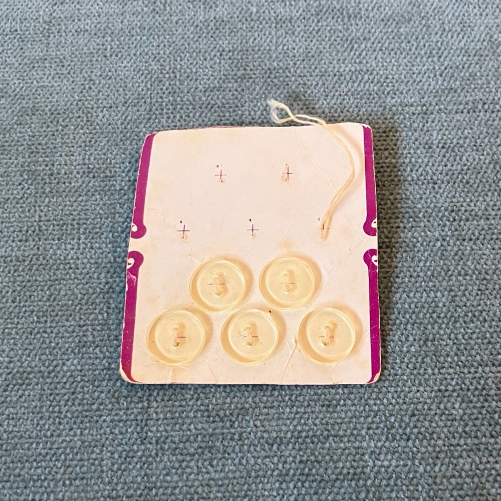 Partially Used Package of Buttons
